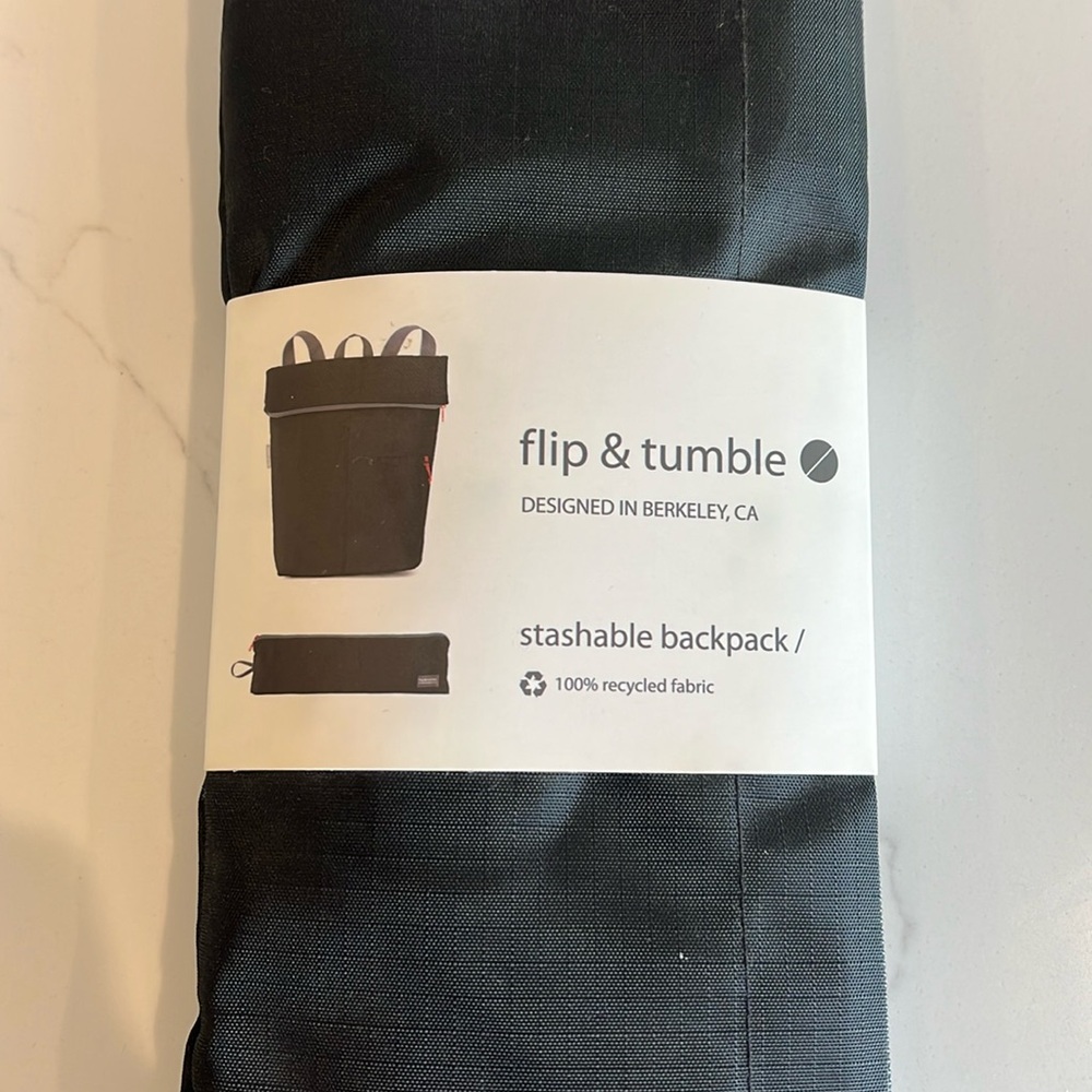NWT flip & tumble Stashable Backpack, Black